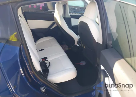 2022 Tesla Model Y Performance Dual Motor All-Wheel Drive z USA, uszkodzony, nr VIN 7SAYGDEF3NF390140